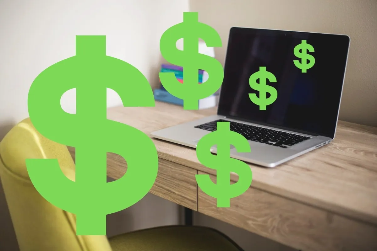 Money coming out of a computer.