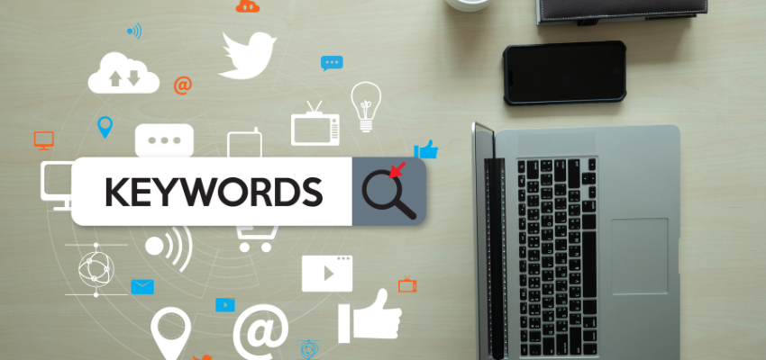 A graphical art of digital marketing and social media symbols with the word "keywords" at the center.