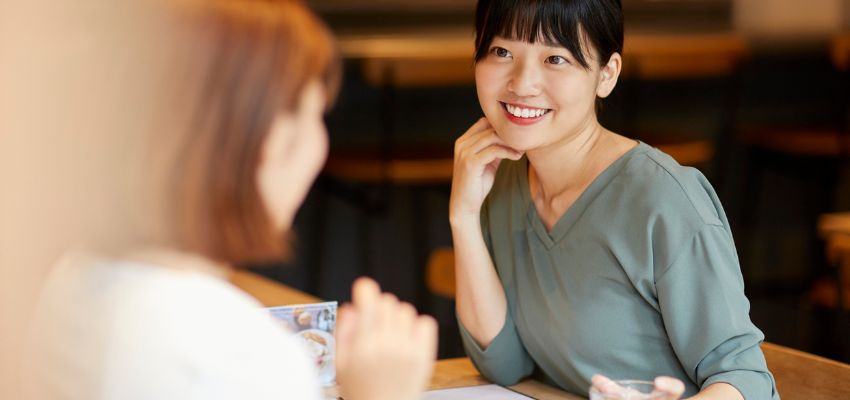 The woman persuades the potential customers.
