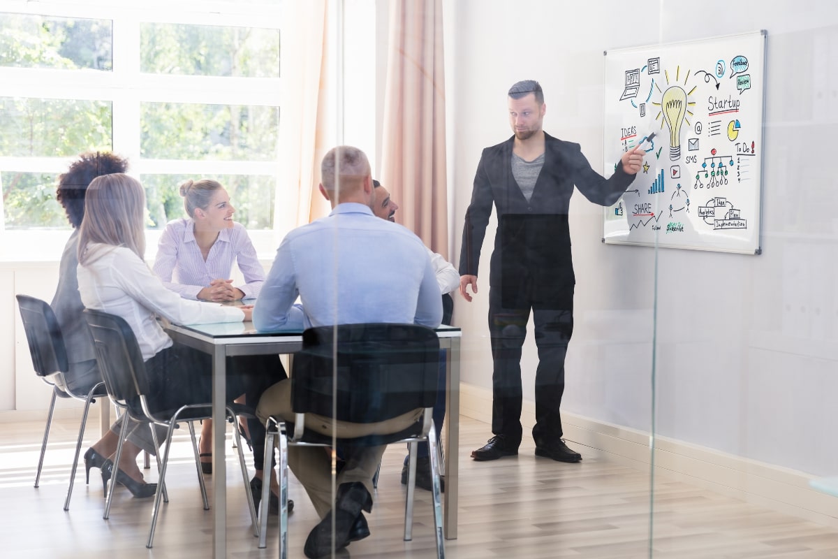 A team discussing strategies for their full service marketing agency