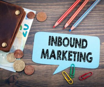 A close up photo of cash and writing materials to highlight inbound marketing examples.