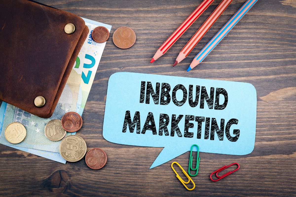 A close up photo of cash and writing materials to highlight inbound marketing examples.