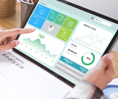 A digital marketer analyzes data.