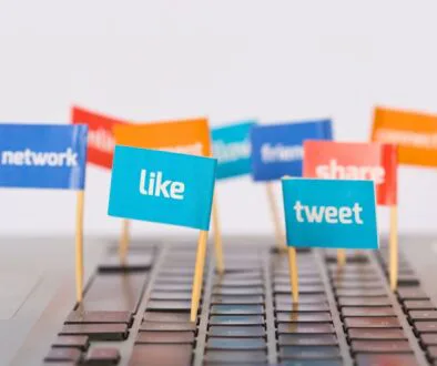 The mini flag has words related to social media cross-posting.