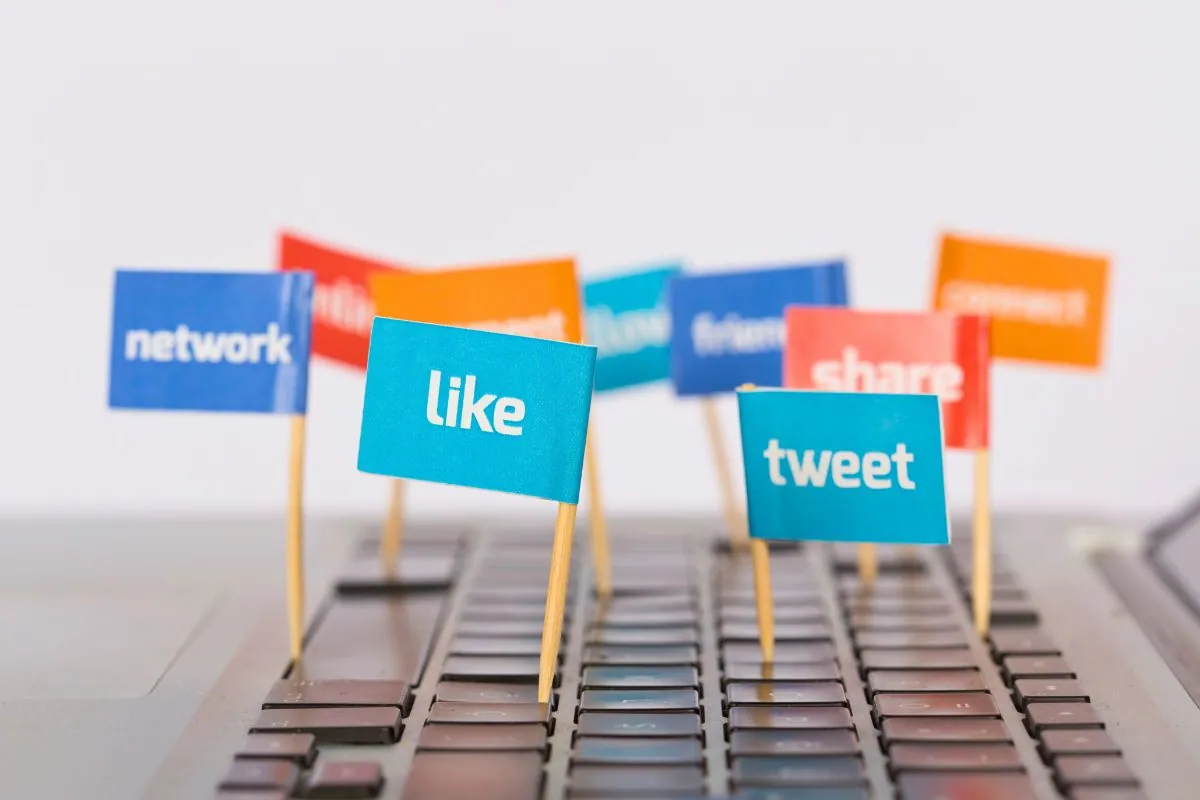 The mini flag has words related to social media cross-posting.