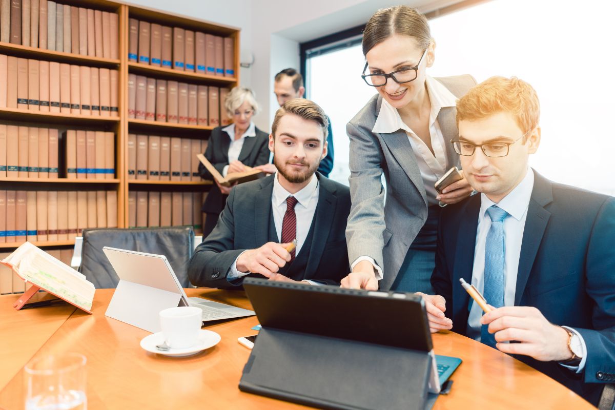 A group of lawyers looking into their law firm marketing strategies.