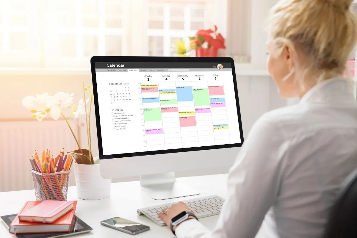 The woman is using one of the trending work organization tools in 2024.