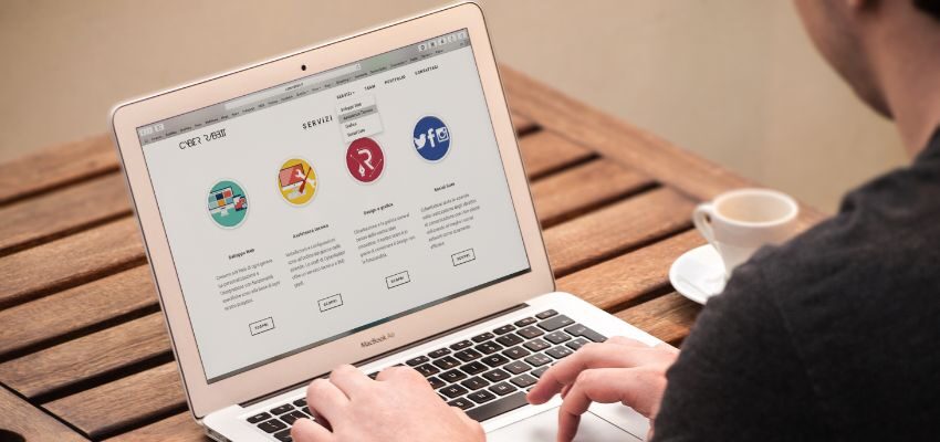 The man is looking for web applications based on his needs.